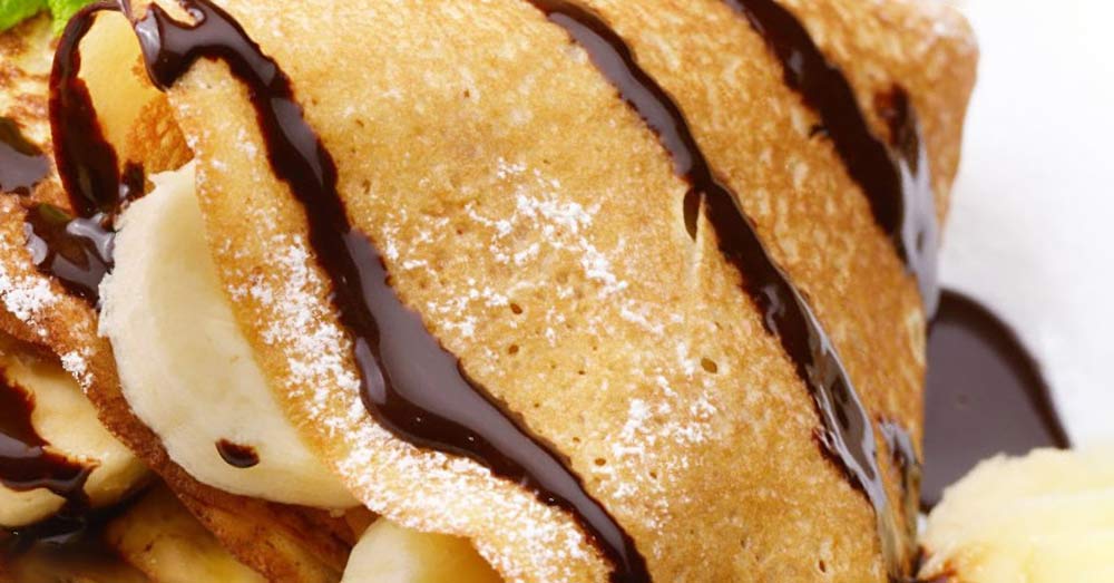 pancakes topped with delicious chocolate syrup